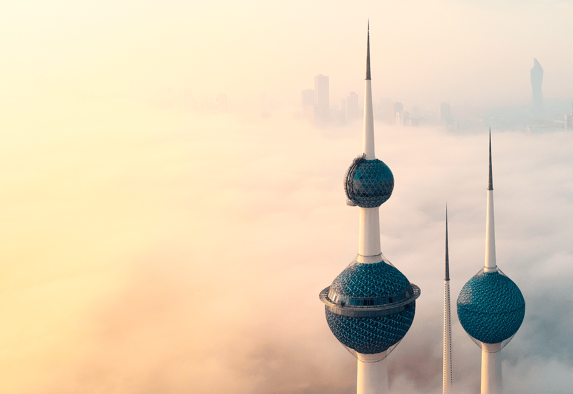 Kuwait towers in the clouds