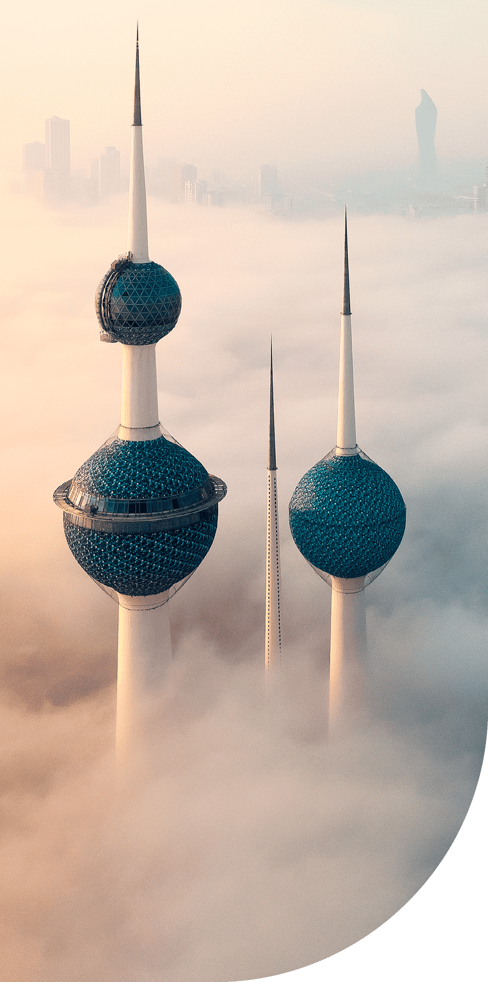 Kuwait towers in the clouds